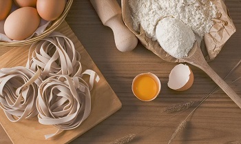 A table with ingredients on it for baking