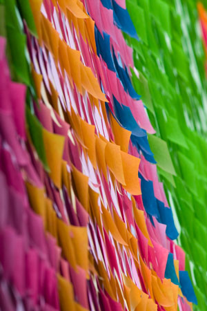 post it notes all over a wall