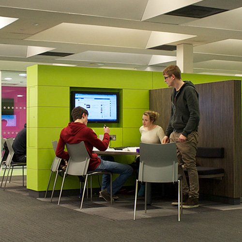 Group of students in library setting 