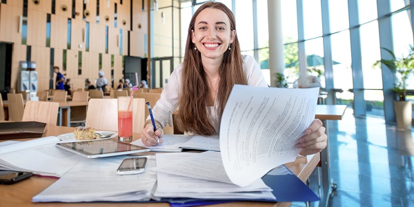 girl studying in university canteen