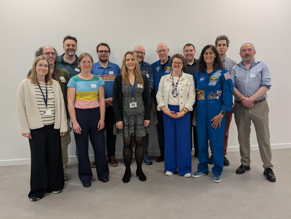 Members of SUPER and attendees at an HE meeting with two NASA astronauts Members of SUPER and attendees at an HE meeting with two NASA astronauts