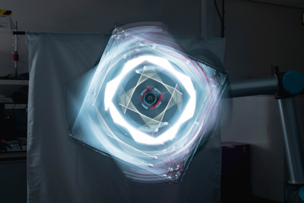 Square of light against dark background with circle of light inside square