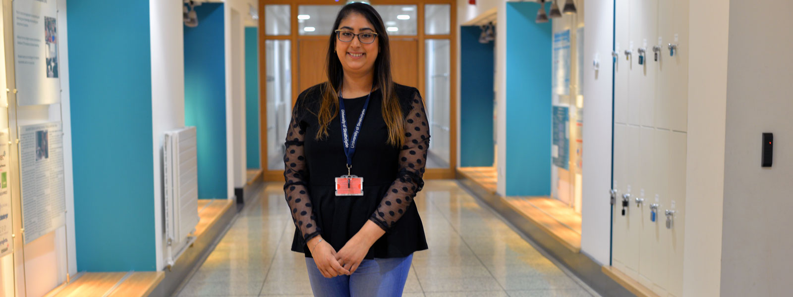 PhD student Aditi smiling at the camera