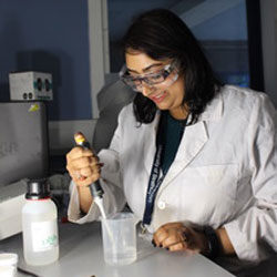 PhD student Aditi working in the lab