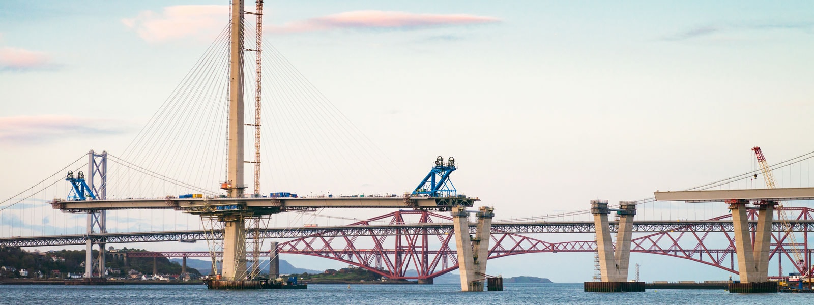 Construction in progress of the new bridge over the Firth of Forth, between Fife and the Lothians.