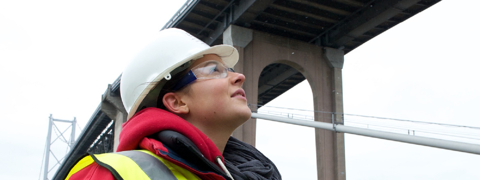 civil engineering student looking at bridge