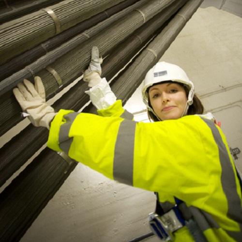 Female civil engineering student in hard hat