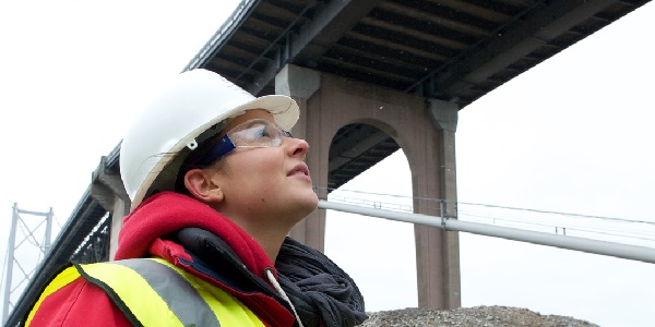 civil and environmental engineering student looking at bridge 