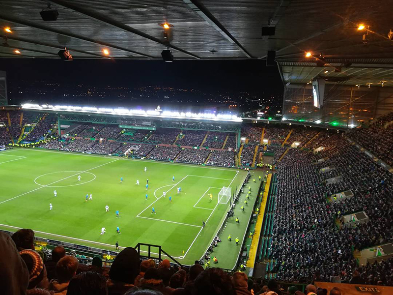 A football match taking place at Celtic Park, Glasgow