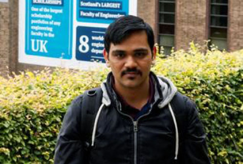 Venkatesh Varadharajan standing outside the James Weir building