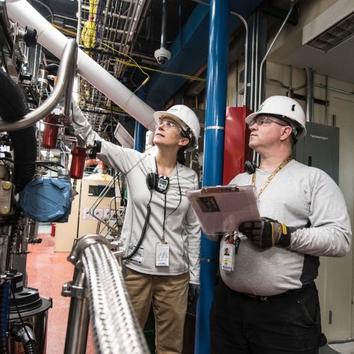 Workers in engine room