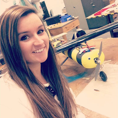 gemma houston with her bumble bee plane 