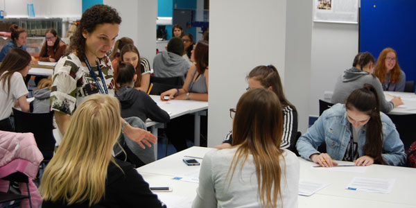 stella teaching a group of female students