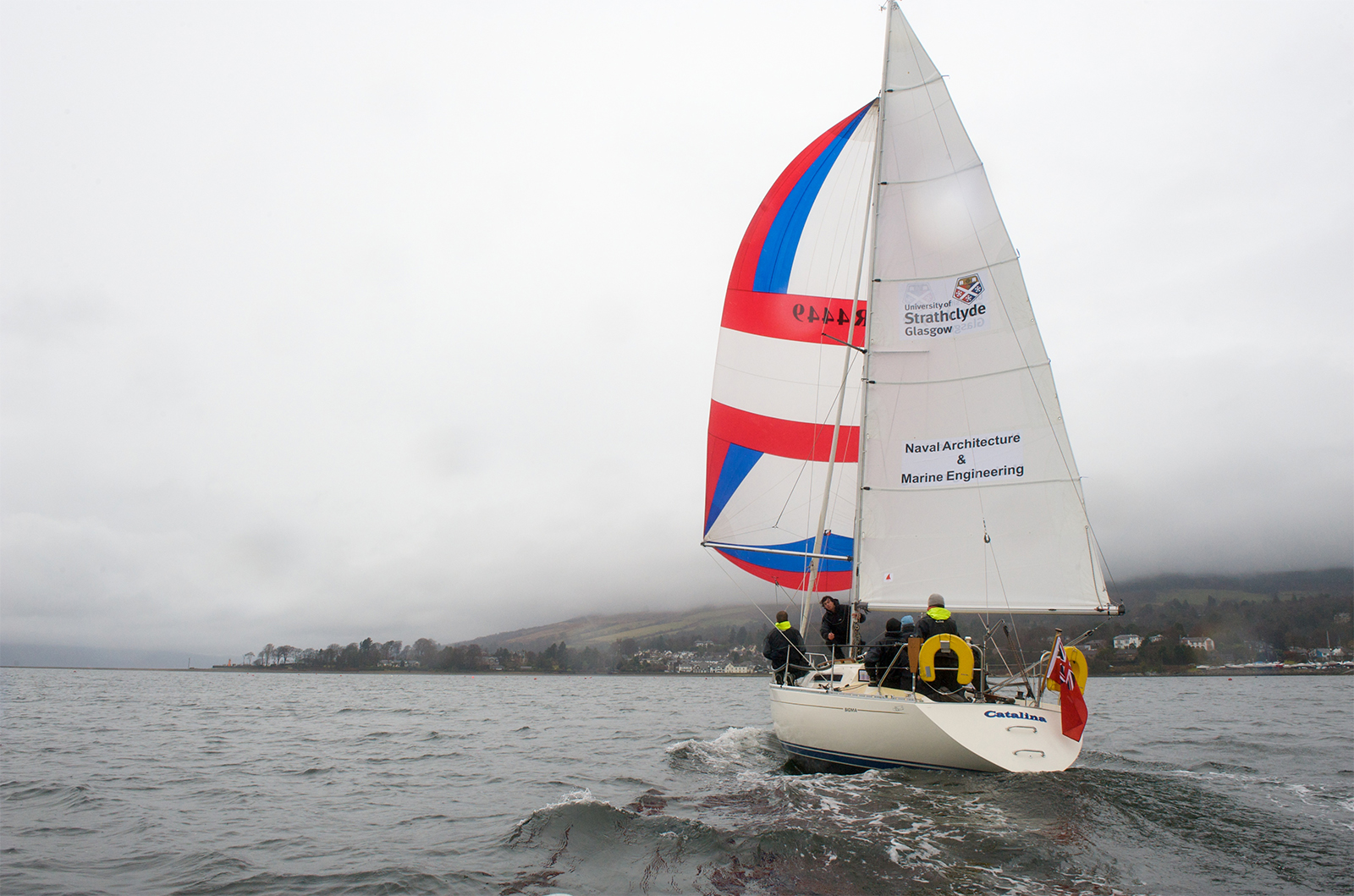 The yacht Catalina sailing on a loch