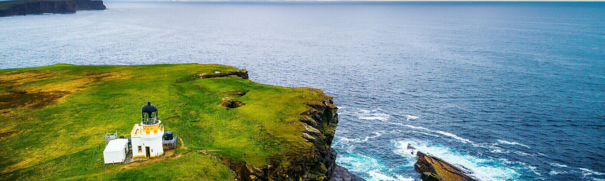 An aerial image of Brough of Birsay Lighthouse on the Orkney Islands