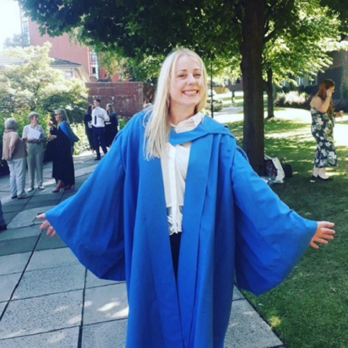Fiona McKay with graduation robe on