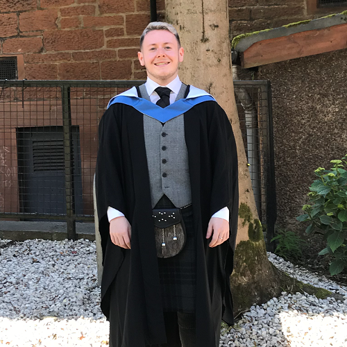 Lewis Creechan in his graduation gown