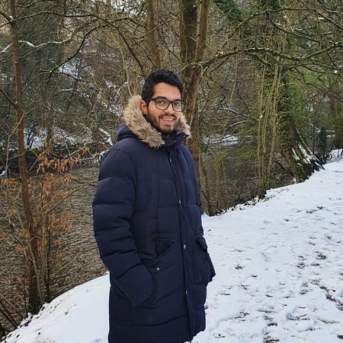 Mouad Bahassan law student, smiling at the camera