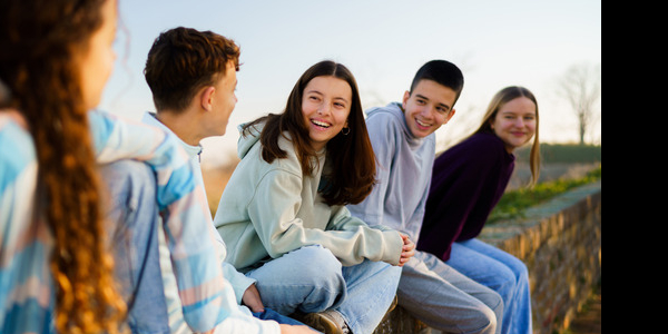 Photo of a group of adolescents smiling