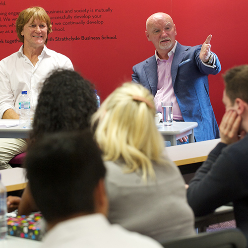 Sir Tom Hunter addressing students