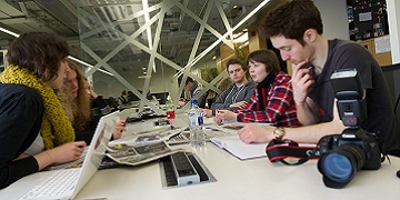 students having an editorial meeting 