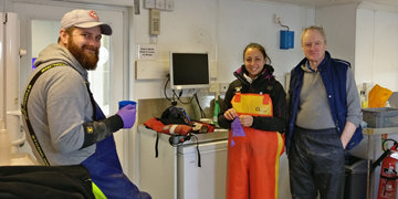 PhD students sampling in the river Clyde