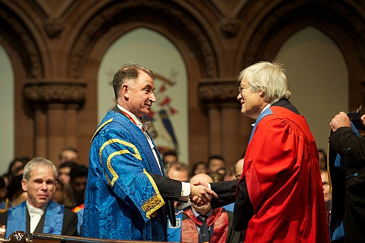 Visiting Prof John Pickup (right) receives honorary degree from Principal Jim MacDonald with Physics HoD Erling Riis looking on (left).