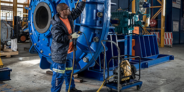 Researcher working with equipment