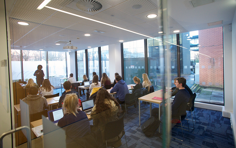 Students in a small lecture room