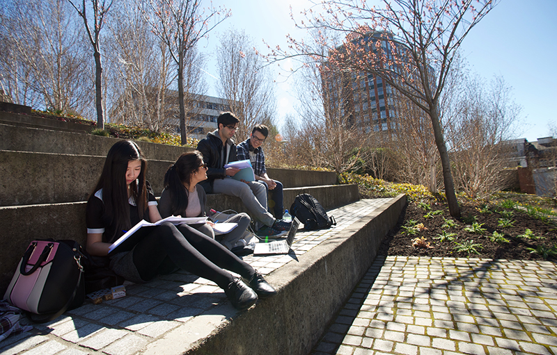 Students studying in Rottenrow Gardens in Spring