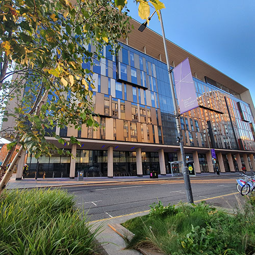 Exterior of the Technology and Innovation Centre with GCID banner