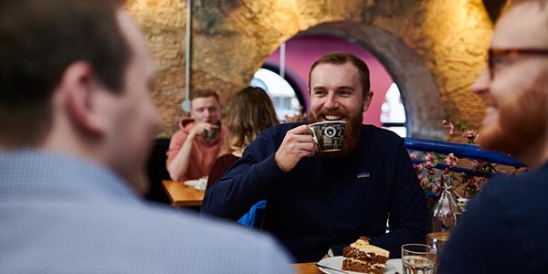 Scott from Revive Eco having a cup of coffee