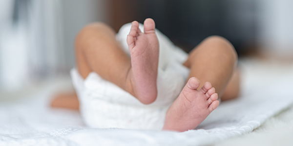 Baby in a hospital bed