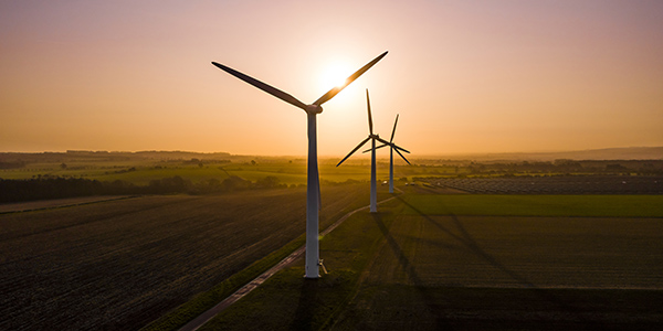 Wind farm with a sunset in the background