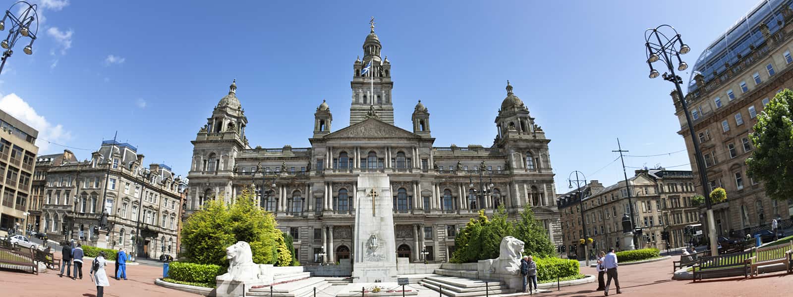 Glasgow locals enjoying the sunshine in George Square