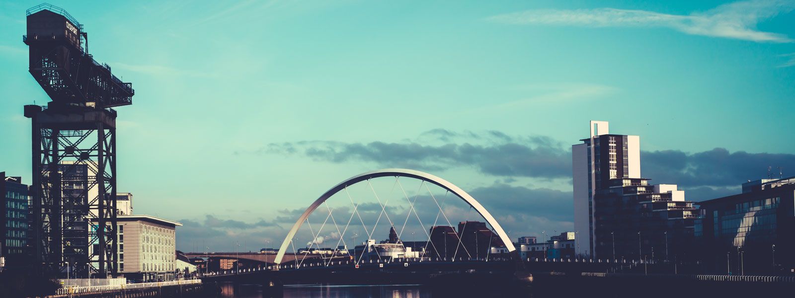 View of the Clyde Arc Bridge and Finnieston Crane, on the River Clyde, Glasgow, Scotland