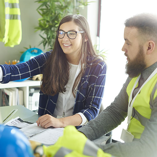 Pair of engineers in an office