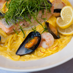 Scottish Salmon with Saffron and Seafood Cream Linguine