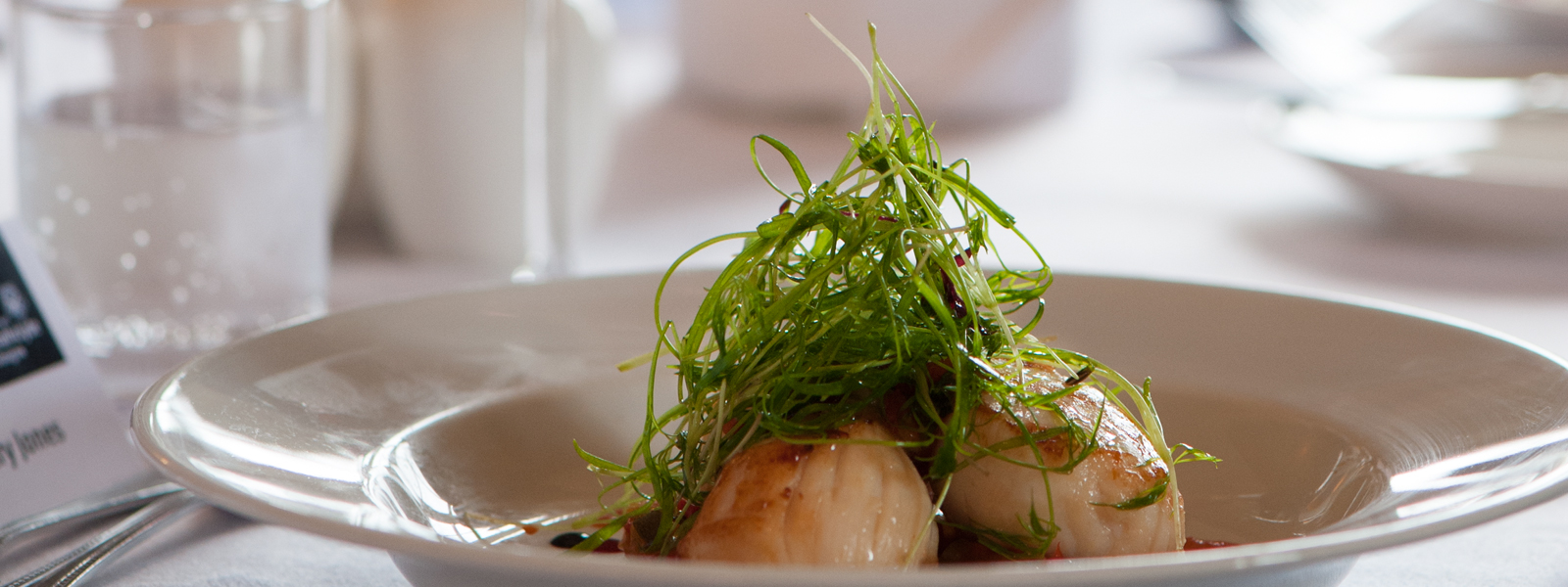 Pan Seared Scallops with Tomato and Red Pepper Chutney, Roasted Red Pepper Coulis and Micro Fennel Salad