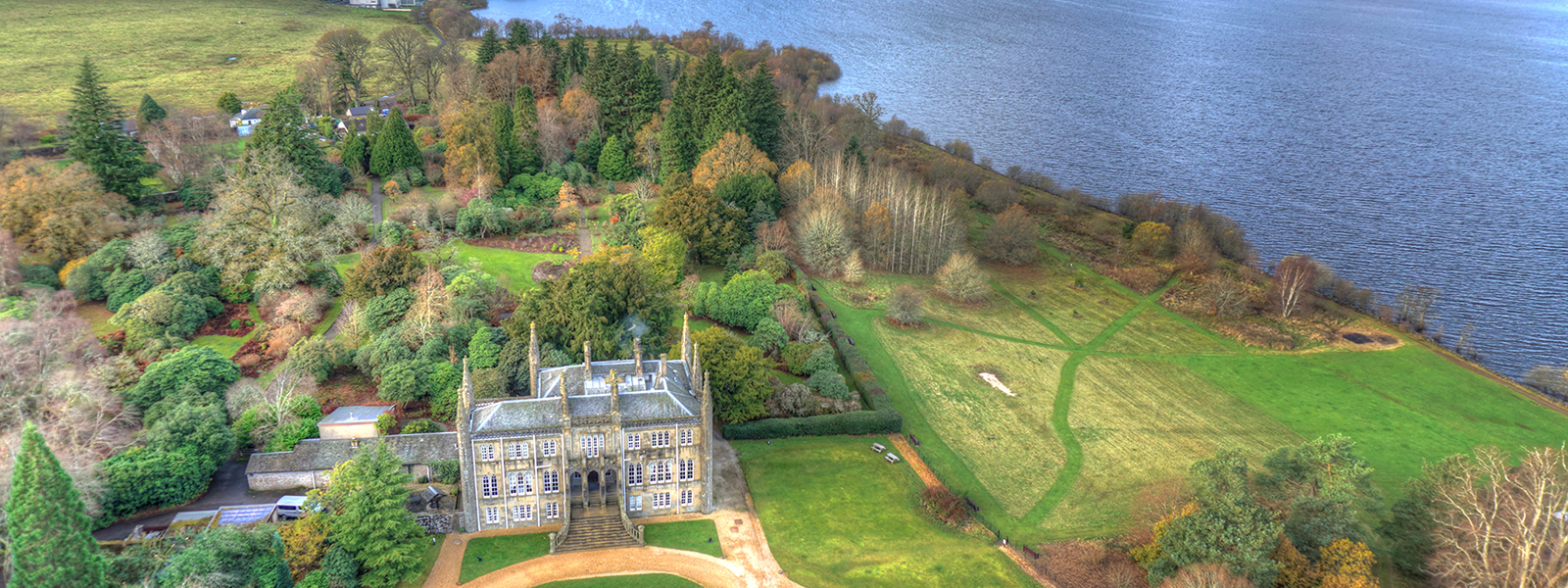 Aerial shot of Ross Priory and grounds, including Loch Lomond. Image courtesy of Aye in the Sky Aerial Photography