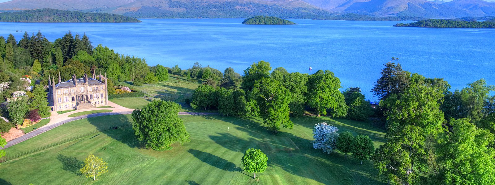 Aerial shot of Ross Priory and grounds, including Loch Lomond. Image courtesy of Aye in the Sky Aerial Photography
