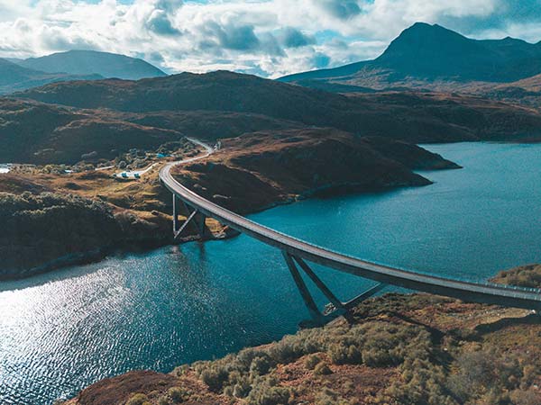 An aerial shot of Kylesku Bridge on the North Coast 500 road.