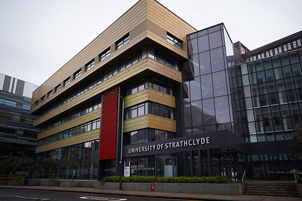 University of Strathclyde signage on the exterior of the Strathclyde Business School building.