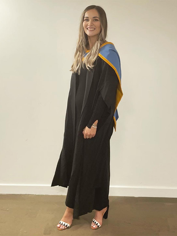 Lucy Morton wearing graduation gown