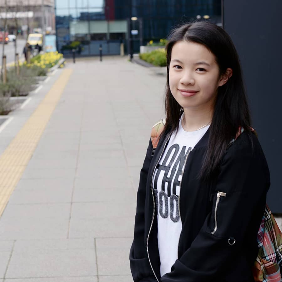Mathematics student, Jessie Sou, standing outside Strathclyde Business School