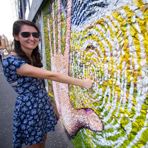 female student interacts with the strathclyde wonderwall