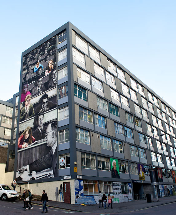 a side view of the gable end of the graham hills building on north portland st featuring students past and present