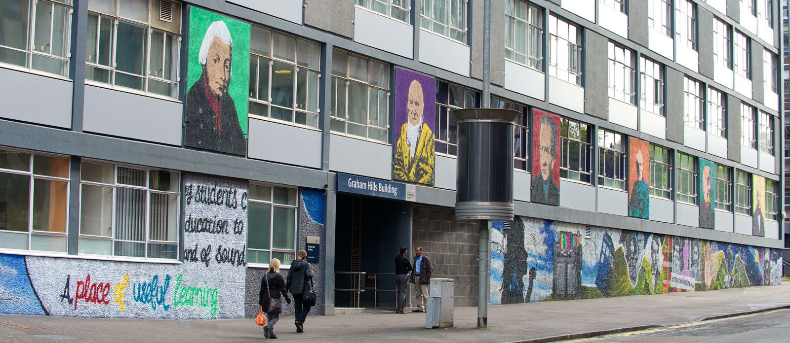 paintings of strathclyde people on the side of the graham hills building