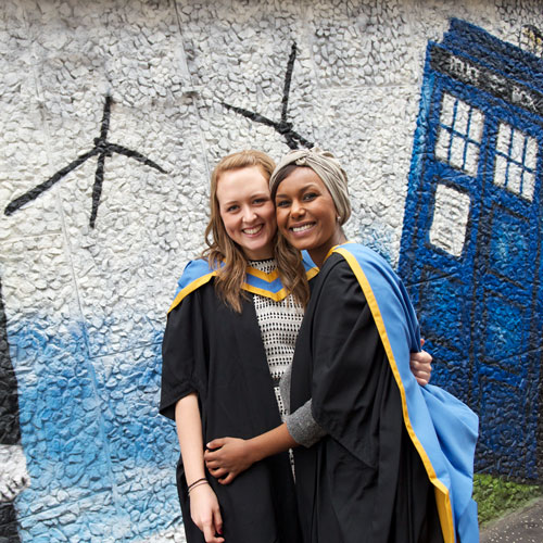 graduates at the wonder wall