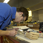 Student working in the national centre for prosthetics & orthotics